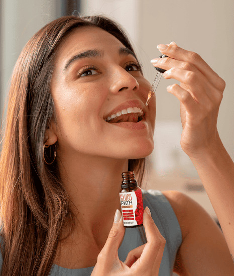 Mulher tomando GlucoPath